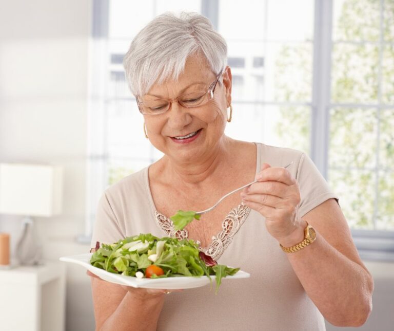 lady-eating-healthy-salad-768x644